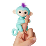 Fingerlings Mono interactivo - Zoe (Turquesa con el pelo morado)