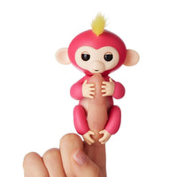 Fingerlings Mono interactivo - Bella (rosa con el pelo amarillo)