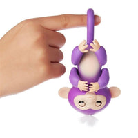 Fingerlings Mono interactivo - Mía (Púrpura con el pelo blanco)