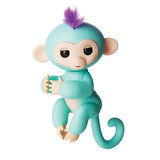 Fingerlings Mono interactivo - Zoe (Turquesa con el pelo morado)